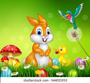 Cute animals  Easter eggs on green grass