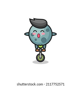 The cute asteroid character is riding a circus bike , cute style design for t shirt, sticker, logo element