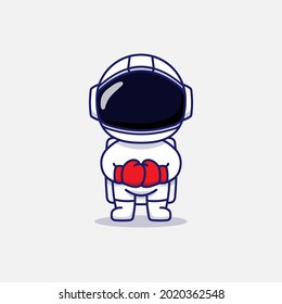Cute astronaut wearing boxing gloves