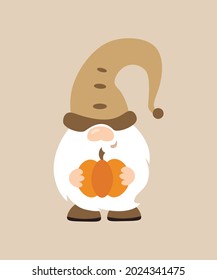 Cute autumn gnome holds a pumpkin in his hands. Baby dwarf fall decor. Scandinavian gnome. Isolated on beige background.