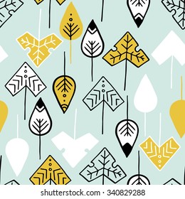 Cute autumn leaves seamless vector background with tribal-style graphic ornaments