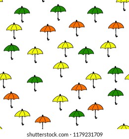 Cute autumn seamless pattern with a set of colored flat umbrellas