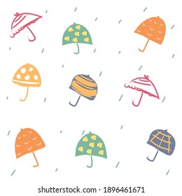 Cute autumn seamless pattern with a set of textured flat umbrellas pattern
