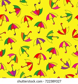 Cute autumn seamless pattern with a set of textured flat umbrellas