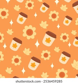 Cute autumn themed pattern features kawaii style coffee cups, sunflowers, and fall leaves on a warm orange background.