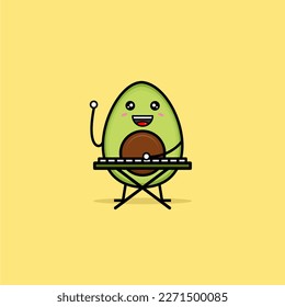 CUTE AVOCADO MASCOT VECTOR DESIGN PLAYING KEYBOARD