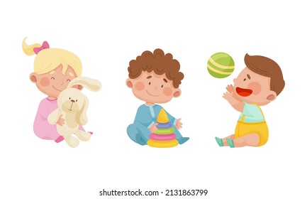 Cute Babies Playing Toys Set. Lovely Toddler Boy And Girl With Bunny, Pyramid And Ball Cartoon Vector Illustration