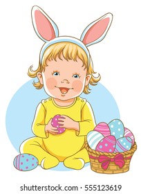 Cute baby with a basket of eggs is dressed in ears of Easter bunny. Portrait of the girl.