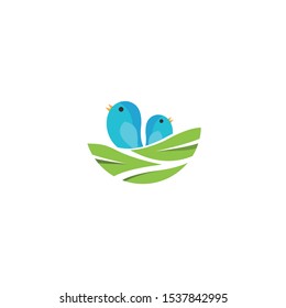 cute baby blue bird in the nest waiting for food from their mother vector logo design