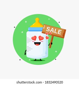 Cute baby bottle mascot with the sales sign