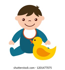 cute baby boy sitting with rubber duck