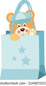 Cute baby boy teddy bear in shopping bag
