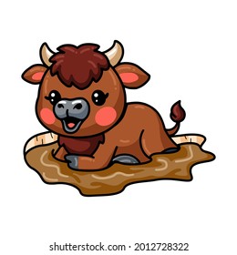 Cute baby buffalo cartoon in the mud