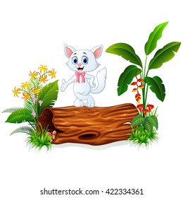 Cute baby cat posing on tree trunk