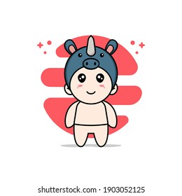 Cute baby character wearing rhino costume. Mascot design concept