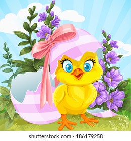 Cute baby chick hatched from an Easter egg on a green lawn with flowers