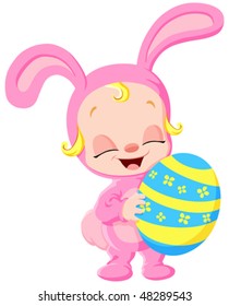 Cute baby dressed up as a pink bunny and holding an Easter egg