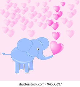 Cute baby elephant making soap bubbles in shape heart
