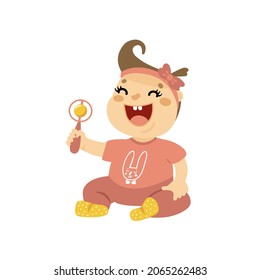 Cute baby girl with rattle. Toddler kid wearing pink romper and bow, playing with toy.  Cartoon child sitting, laughing. Hand drawn vector illustration isolated on white 