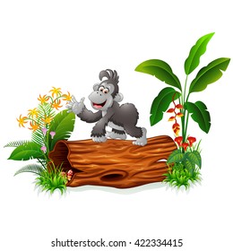 Cute baby gorilla posing on tree stump