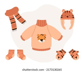 Cute Baby knitted warm autumn and winter Accessories with tiger print. Warm Kids Clothes and Accessories for cold weather. Flat vector illustration.