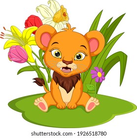 Cute baby lion cartoon sitting in the grass