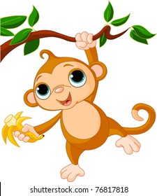 Cute baby monkey on a tree holding banana