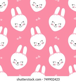 Cute baby pattern with little bunny. Cartoon animal girl print vector seamless. Sweet pink background with white rabbit faces and hearts for children fabric, home textile, nursery or birthday party.