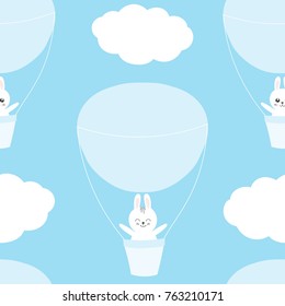 Cute baby pattern with little bunny. Cartoon animal boy print vector seamless with white rabbit, cloud and air balloon. Blue background for kids t-shirt fabric, diaper, children bedroom textile.