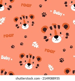 Cute baby pattern with tiger. Traces from the paws of a predator. Illustration with inscriptions Beby and Roar. Vector seamless pattern with animals for children's clothes on an orange background