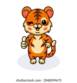 Cute baby tiger cartoon giving thumb up