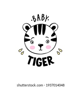 Cute baby tiger head illustration in doodle style. Hand drawn cartoon animal print for kids or babies t-shirt design, room decoration, birthday cards, posters.