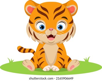 Cute baby tiger sitting in the grass