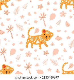 Cute baby tiger walking in the rainforest. Funny seamless vector pattern for kids textile or wrapping paper. Hand drawn print with toy animals and abstract floral ornament on white background