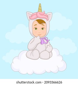 Cute baby in unicorn pijama auf der Wolke