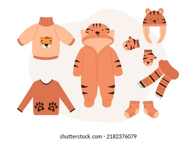 Cute Baby warm autumn and winter Accessories with tiger print. Warm Kids Clothes and Accessories for cold weather. Flat vector illustration.	