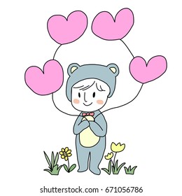 Cute baby wore animal costume. Little kid in teddy bear costume standing and holding heart shape balloons among flowers field. Greeting card with cute baby concept or baby shower invitation.