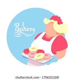A cute baker in a white apron without a face holds a tray of fresh colored glazed doughnuts. Handwritten inscription bakery. Vector cartoon character illustration on a circle background.