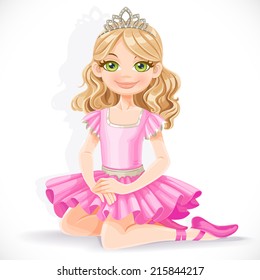 Cute ballerina girl in pink dress and tiara sit on floor isolated on a white background