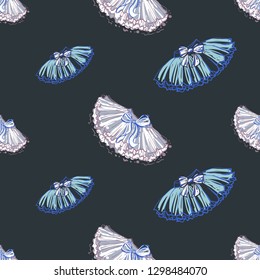 Cute ballet seamless pattern with ballerina skirt and tutu. Hand drawn vector sketch. Baby fashion design. Blue on black background