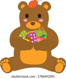 The cute bear in the forest pleased with autumn harvest