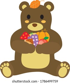 The cute bear in the forest pleased with autumn harvest