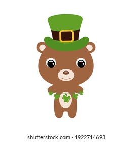 Cute bear in green leprechaun hat. Cartoon sweet animal with clovers. Vector St. Patrick's Day illustration on white background. Irish holiday folklore theme.