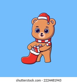 Cute bear putting gift box in Christmas sock