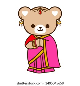 Cute bear in red and pink sari dress. Indian national costume. traditional garment.