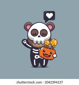 cute bear with skeleton costume holding halloween pumpkin