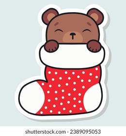 Cute bear sleeps in a Christmas stocking. Happy Holidays. Winter animal. Vector illustration.