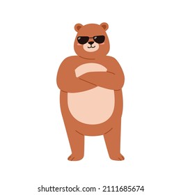 Cute bear in sunglasses. Funny cool teddy portrait. Sweet baby animal in sun glasses standing with arms crossed and smiling. Childish character. Flat vector illustration isolated on white background
