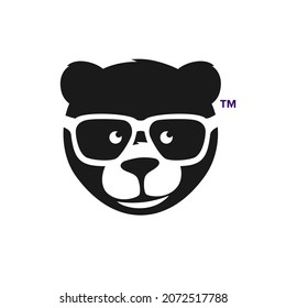 cute bear wearing glasses logo inspiration, head teddy bear silhouette
