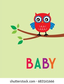 Cute beautiful red and blue owl on a branch in spring